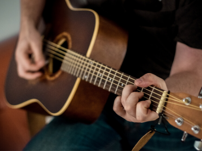 man playing guitar