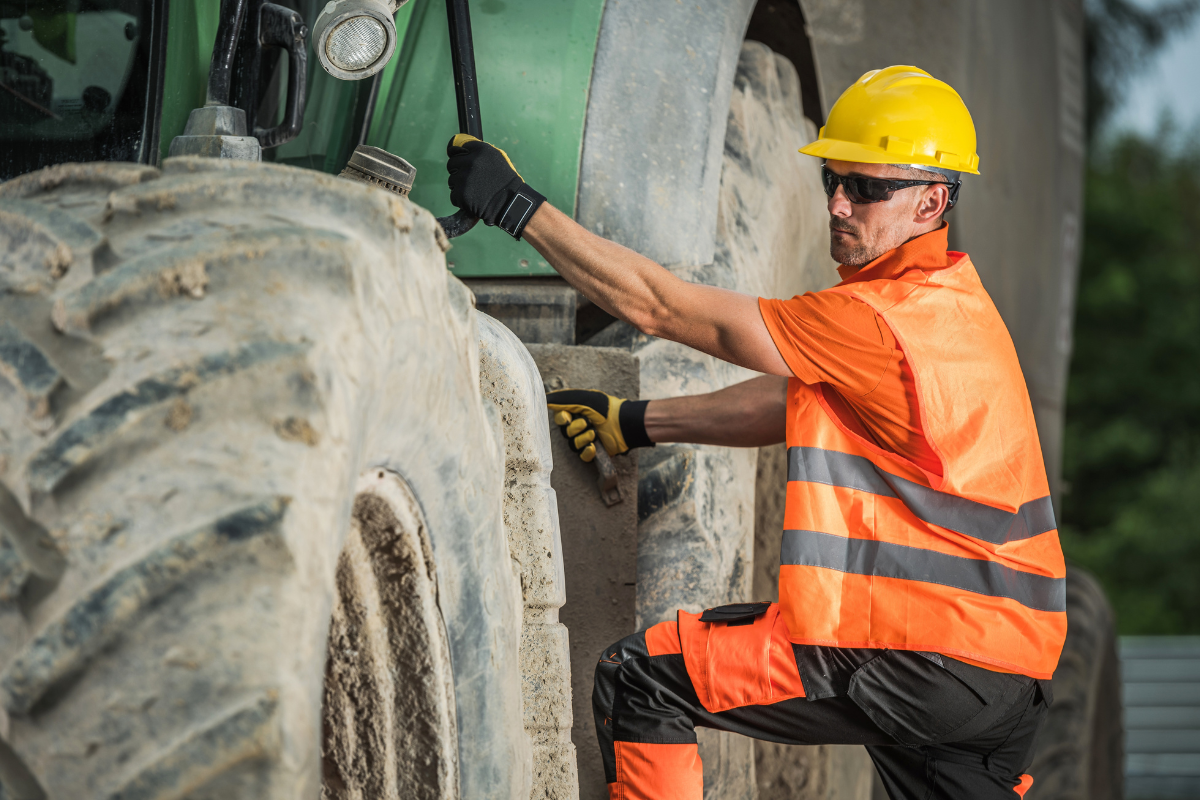 man with loud machinery